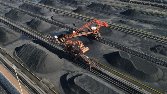 Column-China's iron ore and coal imports ease