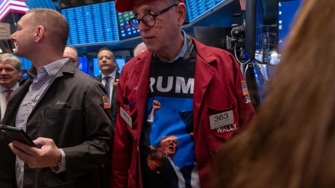 Dow gains 500 points, stocks close near records as