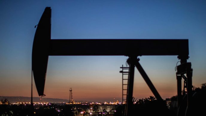 Oil ends higher as traders weigh tariff