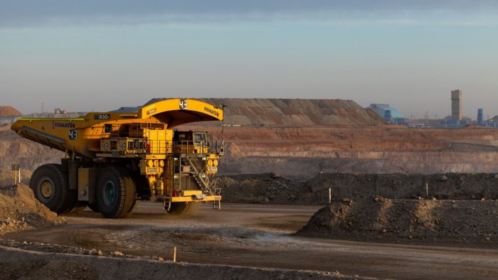 A Komatsu dump truck operating at the open pit mine at the Oyu Tolgoi copper-gold mine