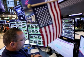 Stocks hover near new records, oil ebbs