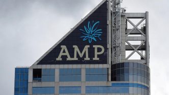 AMP profit almost halves on advice business sale,