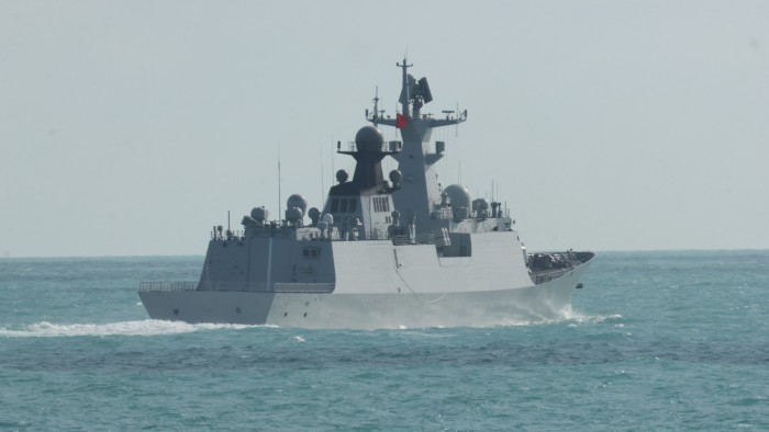 The frigate Hengyang moves through calm waters