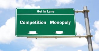 Road sign - competition vs monopoly