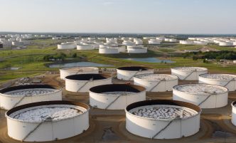 Oil prices drop on rising U.S. inventories and