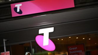 Telstra hikes dividend, announces $750m share