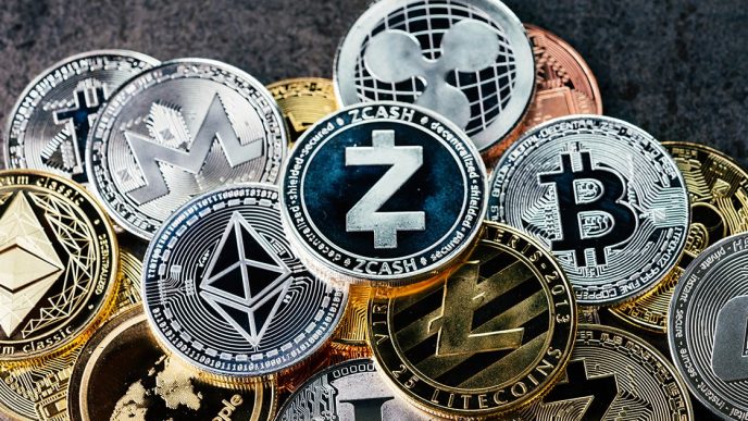 Ether, Bitcoin and other cryptocurrencies represented as actual coins