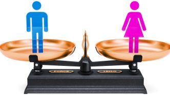 Male and Female figures on scales