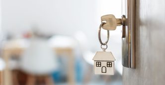 Key in door of residential housing