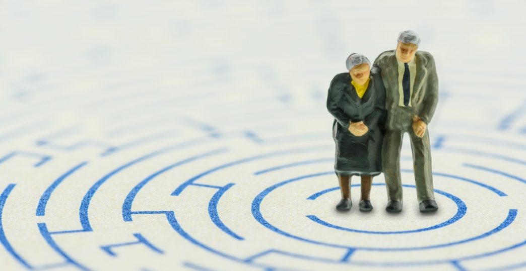 Elderly couple in retirement maze