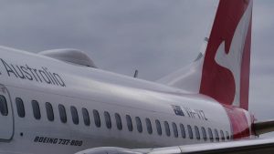 Qantas boss John Mullen warns business about