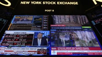 Wall St edges higher on services sector data